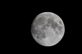 A photograph shows the moon.